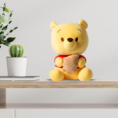 Peluche Colección de Disney Winnie The Pooh Sentado con Galleta