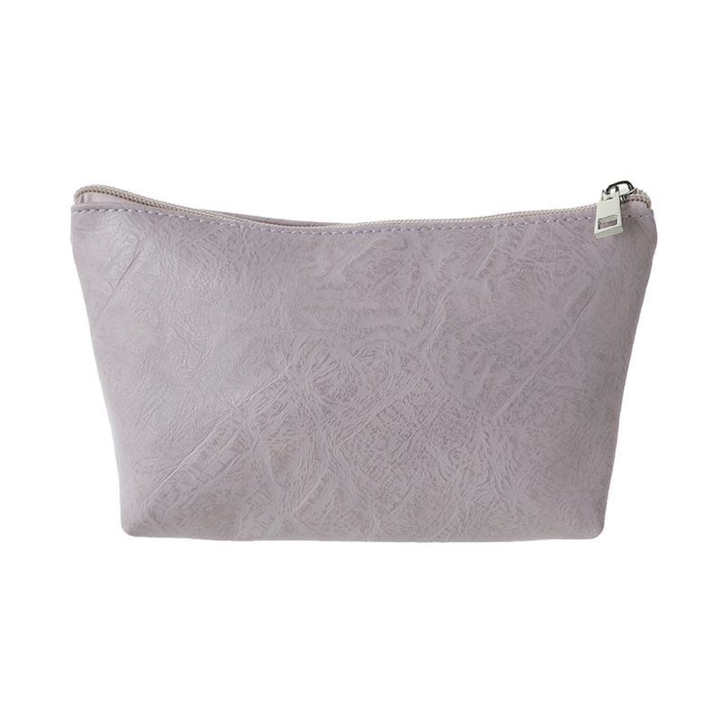 Cosmetiquera-Forma-Trapecio-Miniso-Textura-en-Relieve-Lila-1-16433